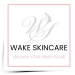 A square logo for Wake Skincare is shown. It features a stylish "WS" monogram with a faint, illustrative profile of a face integrated into the letters. Below the monogram, "Wake Skincare" is written, followed by the tagline "Unleash Your Inner Glow." Known for Hydra Facials and Chemical Peels in Wake County.